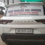 Yash packers car with banner